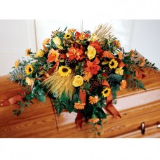 Vibrant Funeral Casket Flowers